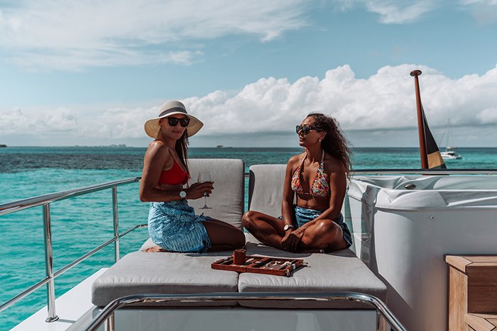 Beachfront yacht flybridge lounging