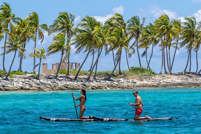 Motor yacht Namaste paddleboarding