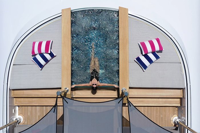 Motor yacht No Bad Ideas 160 a girl in a jacuzzi