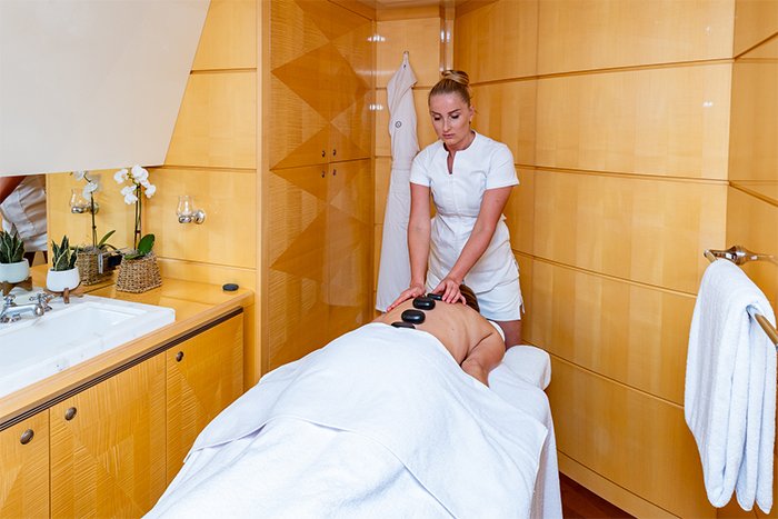 Motor yacht South guest getting a massage