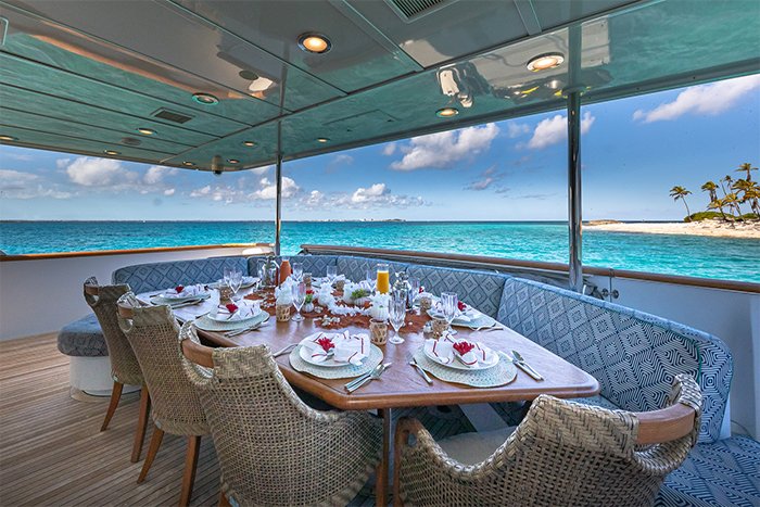 Motor yacht Sweet Escape deck dining b