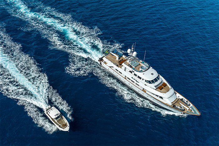 Motor yacht Sweet Escape running with tender